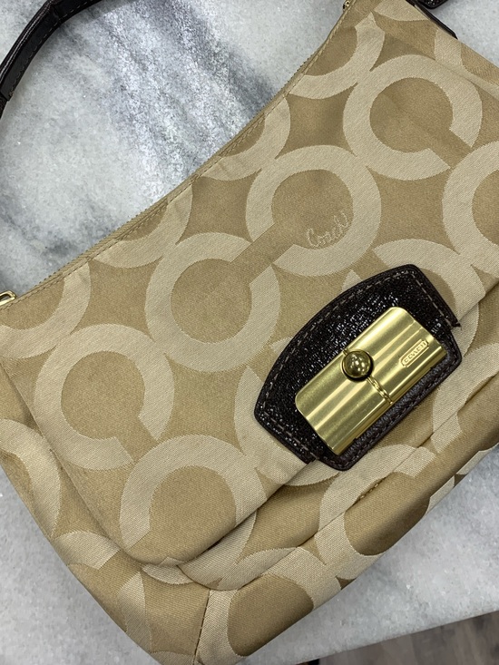 Coach Handbags - Coach Tan Signature Canvas Shoulder Bag with Dark Brown Trim and Gold Hardware